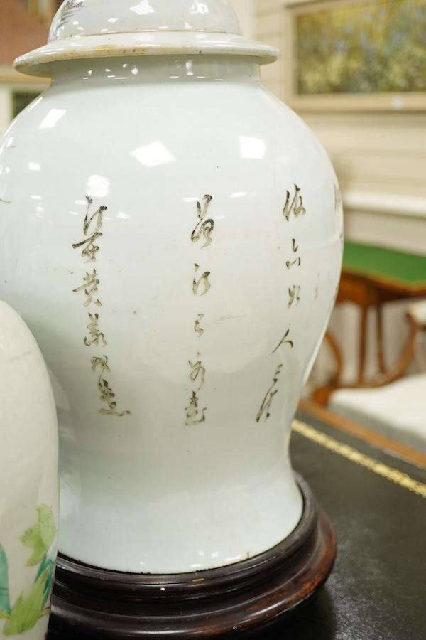 A Chinese famille rose vase and cover on stand, a smaller famille rose vase, vase and cover 50 cm high including stand., Condition - smaller vase in pieces and reglued.